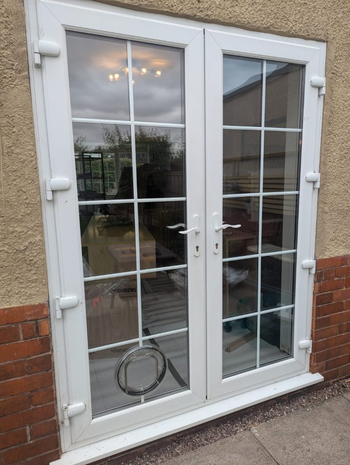 Clear Manual Cat Flap into Glass with Georgian Bead Clear Manual Cat Flap into Glass with Georgian Beading