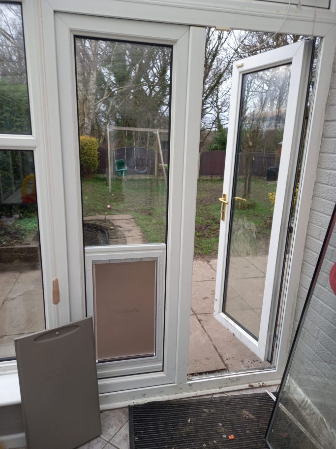 Large Pet Safe Dog Door into uPVC below Glass Large Pet Safe Dog Door into uPVC below Glass